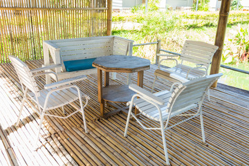 Bamboo terrace and dining table in the morning sun.