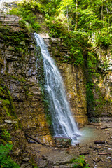 Fototapeta na wymiar Photo of hight waterfall in Carpathian mountains