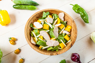 healthy chicken salad in bowl, top view