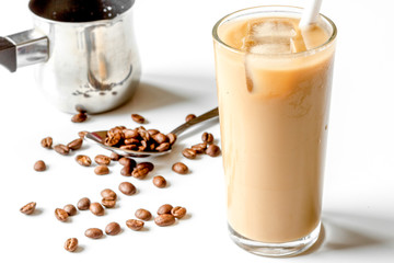 coffee with ice in glass on white background
