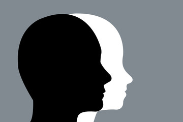 Head silhouettes of a men and women on a gray background.