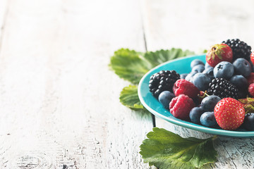 different berries in bowl.