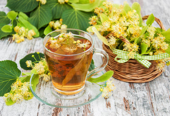 cup of herbal tea with linden flowers