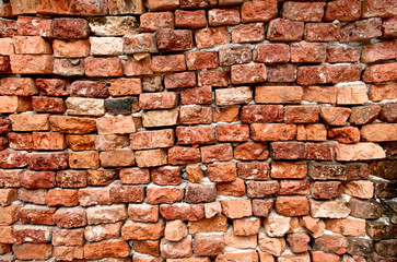 Cracked brick wall texture old background. Urban concrete and various rough grunge block. Close up.