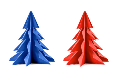Origami Christmas tree paper isolated on white background. For decoration, Merry Christmas or Happy New Year postcard. Blue and red color. Front view. Close up.