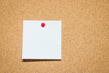 Notes pinned on cork board, reminder