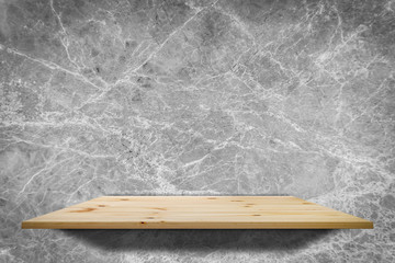 empty top wooden shelves with concrete wall background