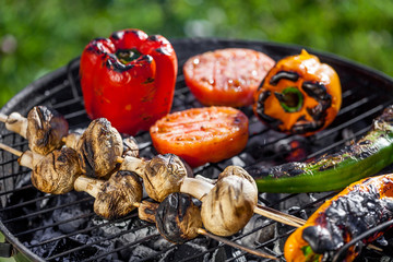 american barbecue - preparing bbq vegetables on charcoal grill