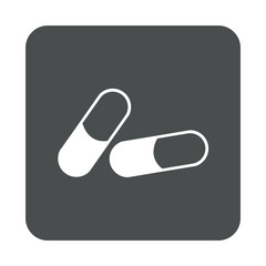 Icono plano pildoras en cuadrado gris