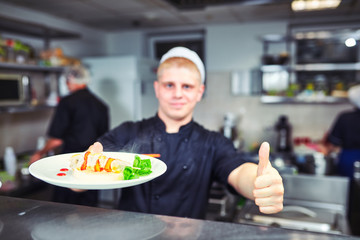 cook chef at restaurant kitchen