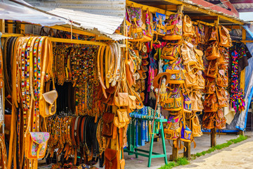 Fototapeta na wymiar View on Indigenous leather handicrafts on market in Oaxaca - Mexico