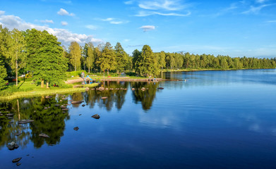 Fototapeta na wymiar Summer Swedish lake with reflection - aerial view
