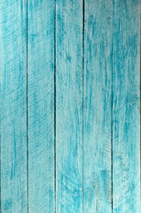 Fototapeta na wymiar Painted in blue and white color wall with wooden planks.