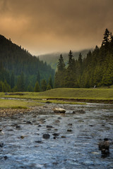 Small stream of water running through the valley.