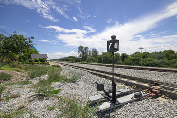 37 Hand-operated railroad switch at train station. sunny day