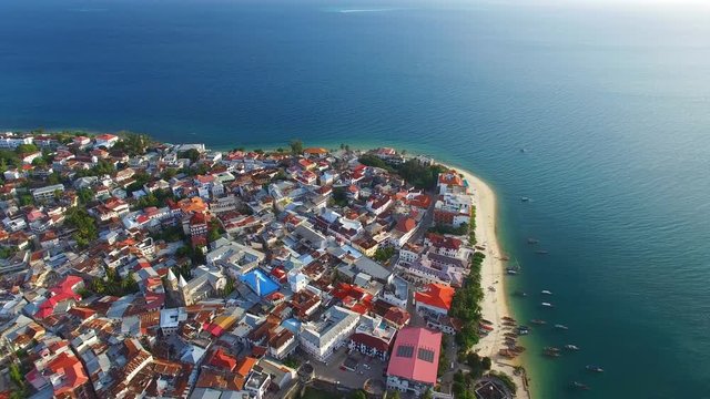 Aerial view of the Stone Town, old part of Zanzibar City, main city of Zanzibar, Tanzania from above, Africa, Indian Ocean, 4k UHD