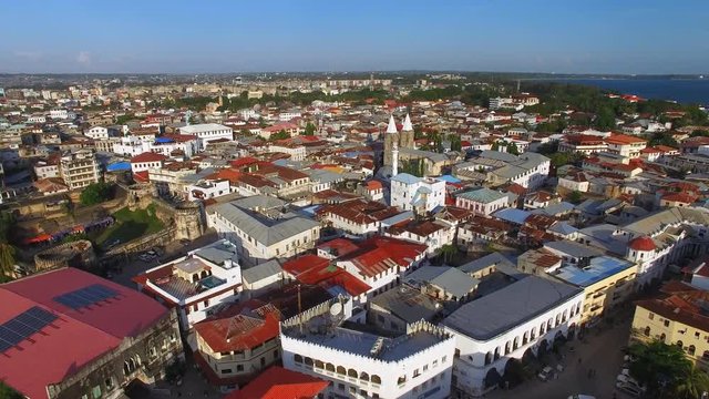 Aerial view of the Stone Town, old part of Zanzibar City, main city of Zanzibar, Tanzania from above, Africa, Indian Ocean, 4k UHD