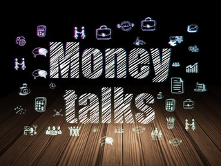 Fototapeta na wymiar Finance concept: Money Talks in grunge dark room