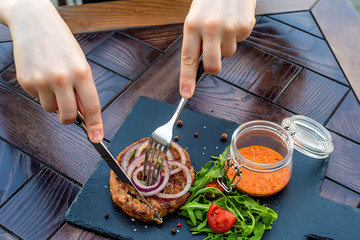 Grilled steak of chopped beef with vegetables