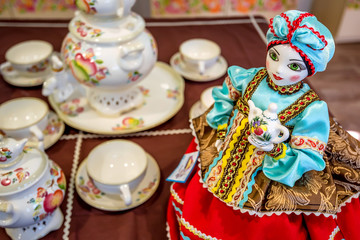 Beautiful delft doll in costume part of tea set
