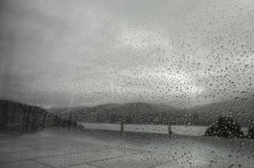 Raindrops on the window. Black and white photo