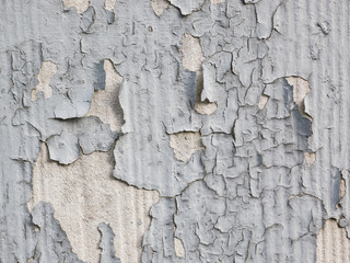 Flaking old paint textured wall background.