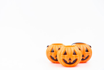 Jack o'lantern pumpkinhead plastic on white background used for decorations on halloween day.Theme Halloween background.
