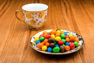 Colored sweets in chocolate