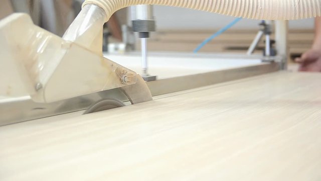 Production of cabinet furniture, sawing, materials on a format-cutting machine