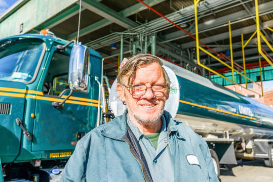 Portrait of male trucker at biofuel industrial plant