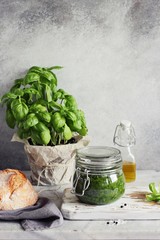 Pesto and ingredients for making of traditional mediterranean dinner. Selective focus