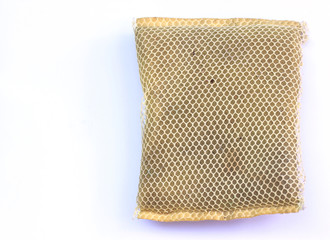 dirty scourer on a white background