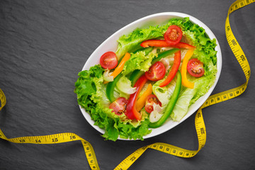 Healthy fitness meal with fresh salad. Diet concept.