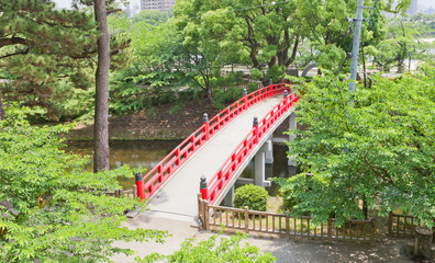 Fototapeta premium Red bridge in Okazaki Castle, Aichi Prefecture, Japan
