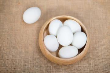 Salted duck egg in wooden cup