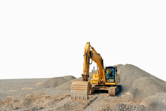 Tracked Excavator On A Construction Site Among Piles Of Rubble Isolated