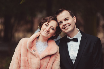 Beautiful bride and groom couple walking at the wedding