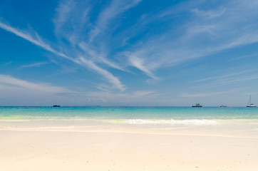 Sea beach blue sky sand sun daylight relaxation landscape viewpoint with sailboat at Maiton Island, Thailand.