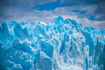 Beautiful blue glacier against the sky. Shevelev.