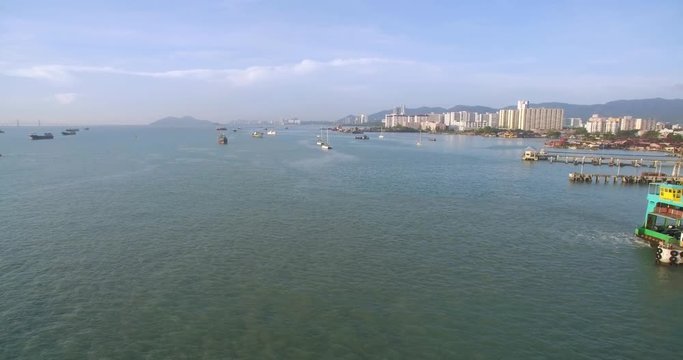 Car Ferry Docked at Weld Quay, George Town, Penang, Malaysia, Aerial Slider Reveal
