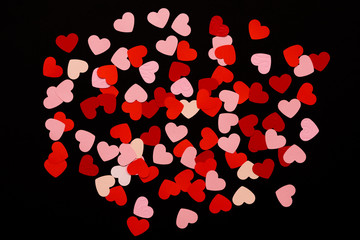 Valentines day background with pink and red hearts