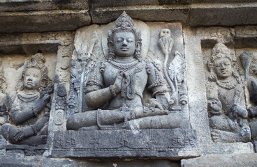 Fototapeta na wymiar details of reliefs in Prambanan Hindu temple , central java