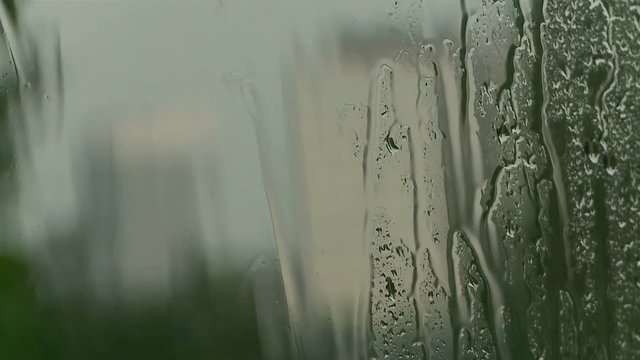 Rainy and bad weather outside the window