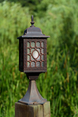 Obraz premium Old lamp in park