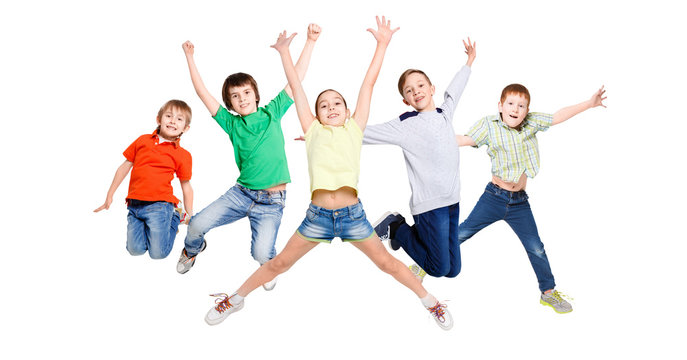 Group of children jumping at white isolated studio background