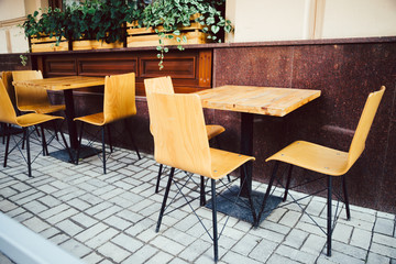 Empty chairs in outdoor cafe or restaurant