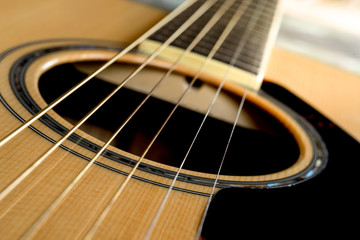detail of classic guitar with shallow depth of field