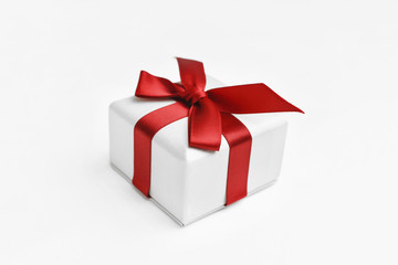Gift box with red bow. Isolated on white background