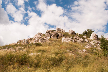 Mountain range, hill, trees and clouds