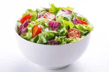 Rolgordijnen Fresh salad in a bowl. Healthy lettuce and tomato meal on white background © virtustudio